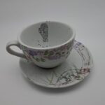 Taza y plato de Porcelana fauna combinada